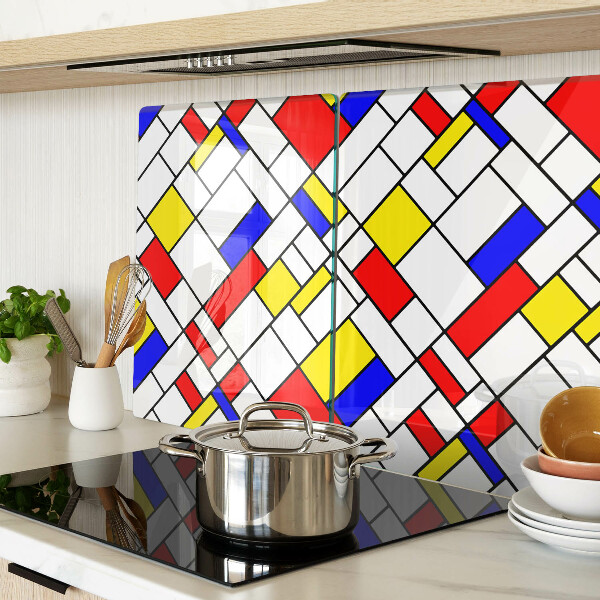 Glas-Schneidebrett mit einem geometrischen Mondrian‑Motiv