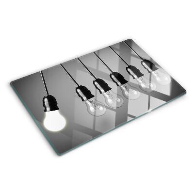 Schneidebrett Glühbirnen an Kabeln