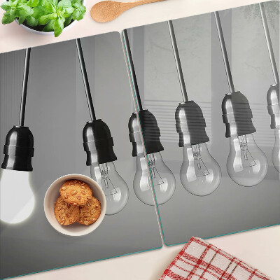 Schneidebrett Glühbirnen an Kabeln