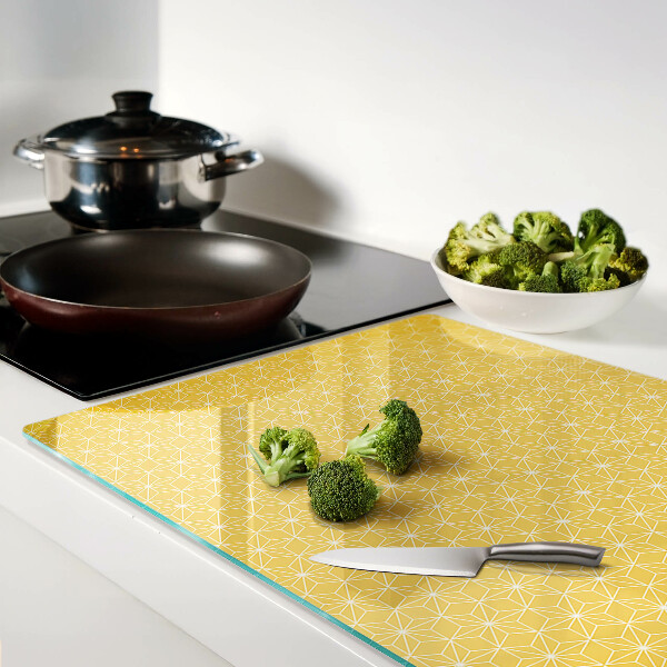 Schneidebrett Glas mit dem Motiv Blume des Lebens auf gelbem Hintergrund