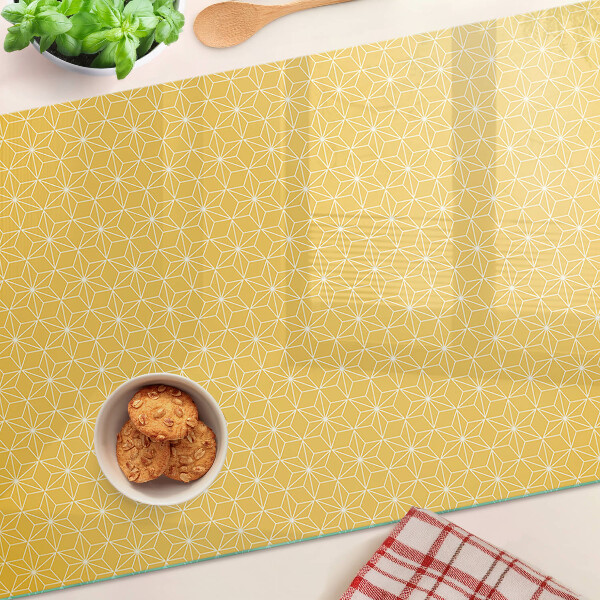 Schneidebrett Glas mit dem Motiv Blume des Lebens auf gelbem Hintergrund