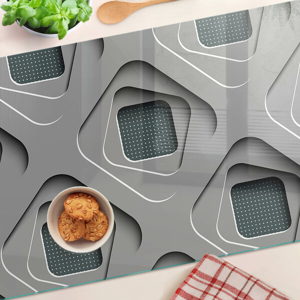 Schneidebrett mit geometrischem Muster in Grautönen