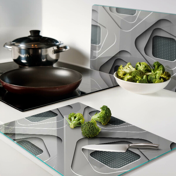 Schneidebrett mit geometrischem Muster in Grautönen