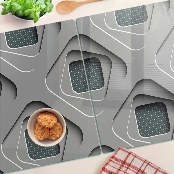 Schneidebrett mit geometrischem Muster in Grautönen