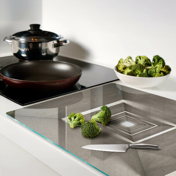 Schneidebrett Glas mit geometrischem Innenraum und Tiefeneffekt