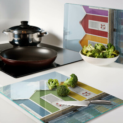 Glas Schneidebrett mit Motiv bunter Küstenhäuser