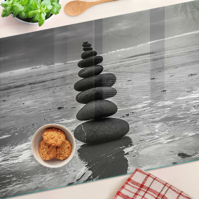 Glas Schneidebrett mit schwarzem und weißem Strandsteinmuster