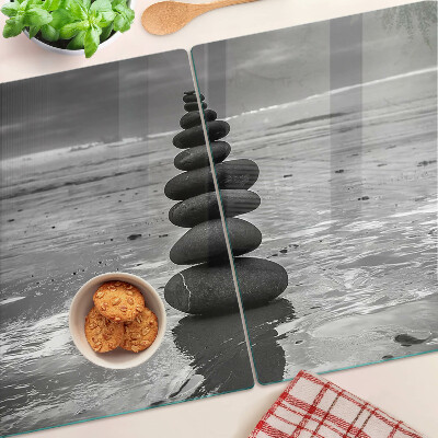 Glas Schneidebrett mit schwarzem und weißem Strandsteinmuster