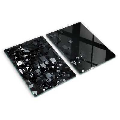 Schneidebrett mit abstraktem schwarzen Würfelmotiv