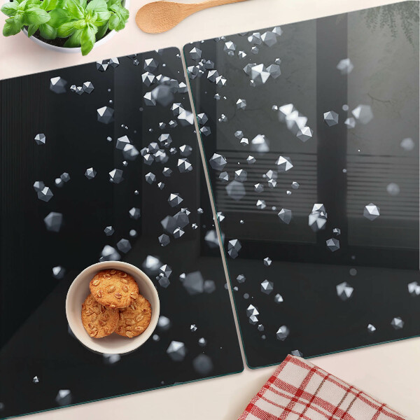 Schneidebrett mit Kristallblasen-Motiv auf schwarzem Hintergrund