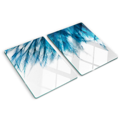 Schneidebrett Glas mit blauem Federmotiv auf weißem Hintergrund