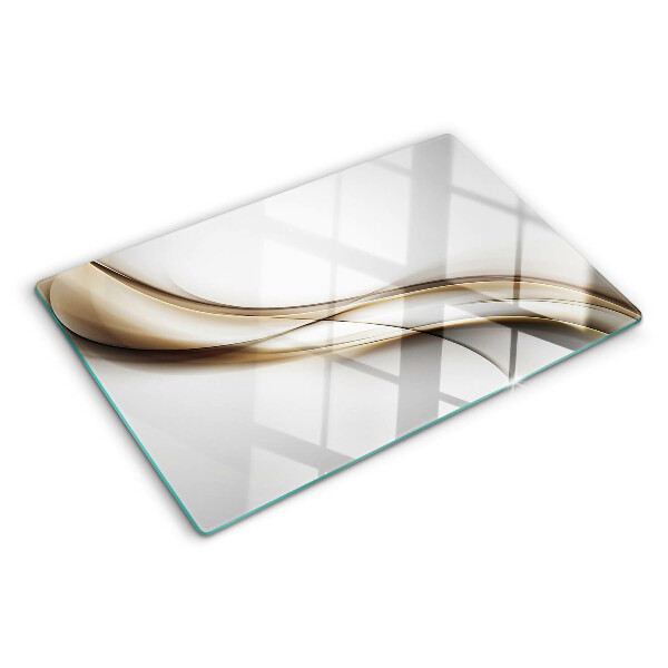 Schneidebrett mit wellenförmigem Muster in Beigetönen