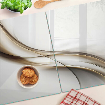 Schneidebrett mit wellenförmigem Muster in Beigetönen