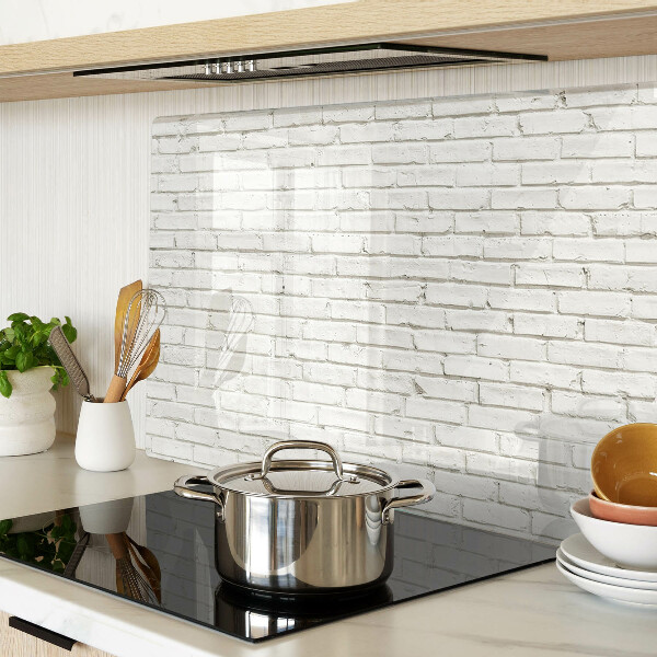 Schneidebrett Glas mit Motiv einer weißen Backsteinmauer