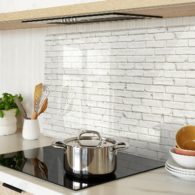 Schneidebrett Glas mit Motiv einer weißen Backsteinmauer