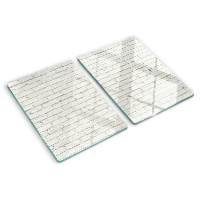 Schneidebrett Glas mit Motiv einer weißen Backsteinmauer