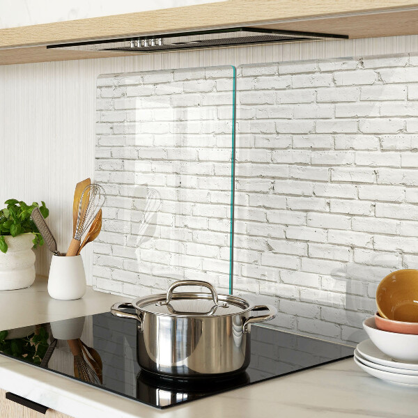 Schneidebrett Glas mit Motiv einer weißen Backsteinmauer