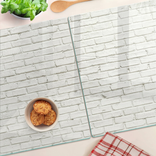 Schneidebrett Glas mit Motiv einer weißen Backsteinmauer