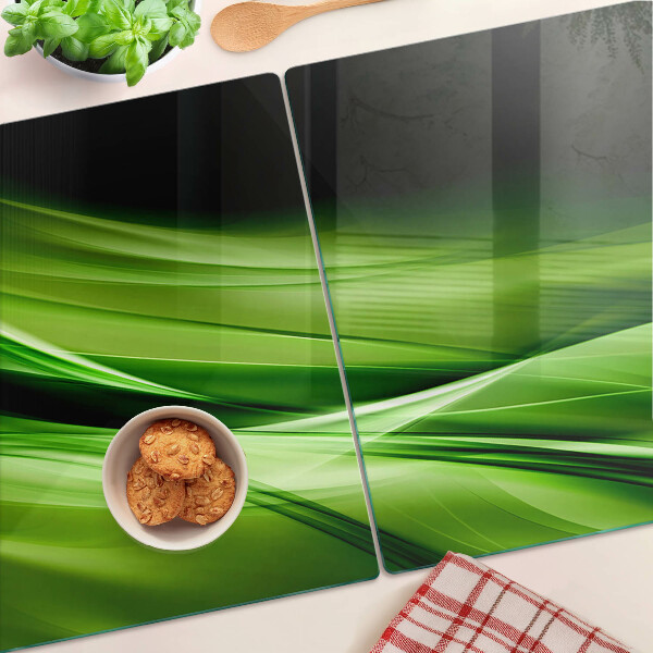 Schneidebrett mit grünem abstraktem Wellenmotiv