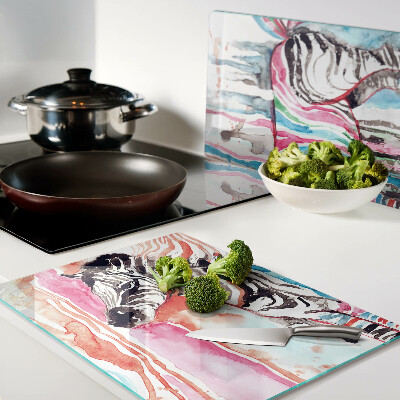 Schneidebrett aus Glas mit Zebramotiv in bunten Streifen