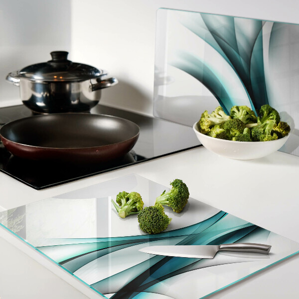 Glas-Schneidebrett mit wellenförmigem Muster in Blautönen