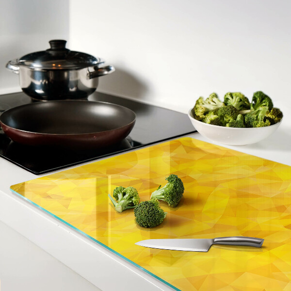 Schneidebrett Glas mit gelbem geometrischem Mosaik