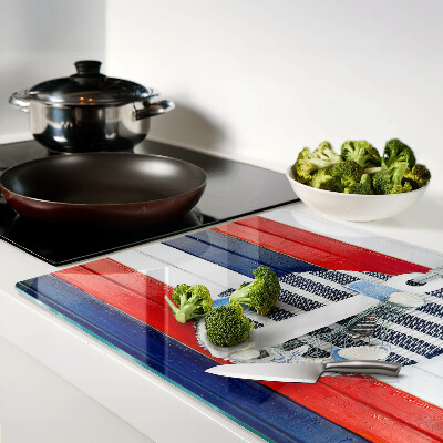 Glas schneidebrett Anker vor dem gestreiften Hintergrund