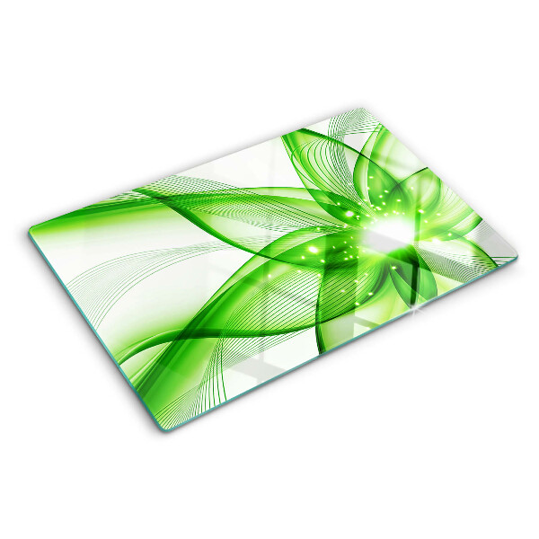 Glas-Schneidebrett mit grünem abstraktem Wellenmotiv