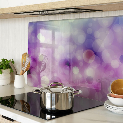 Glas-Schneidebrett mit Bokeh-Motiv in Lila- und Rosatönen
