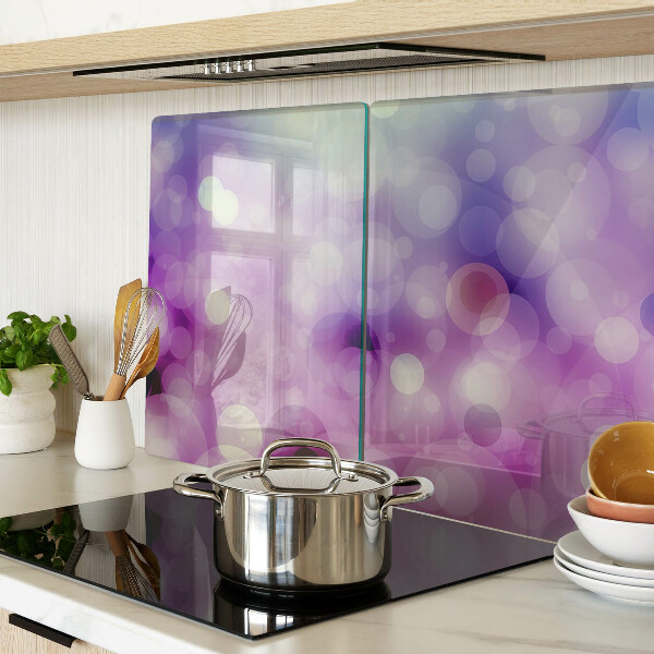 Glas-Schneidebrett mit Bokeh-Motiv in Lila- und Rosatönen
