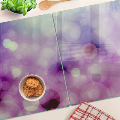 Glas schneidebrett Bokeh in Lila- und Rosatönen