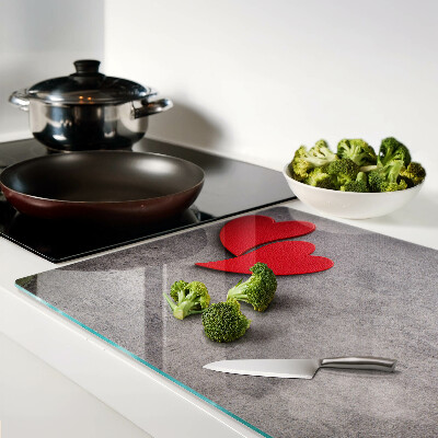 Schneidebrett Ein Herz vor dem Hintergrund eines Fensters