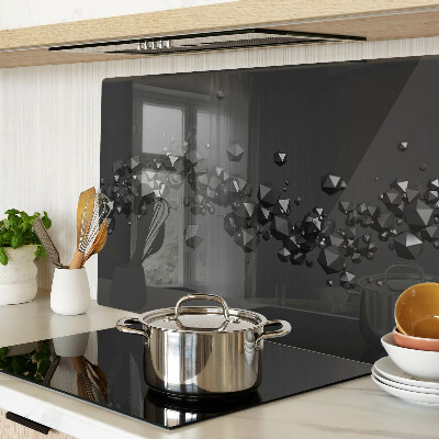 Schneidebrett glas Schwarze Kristalle im Hintergrund