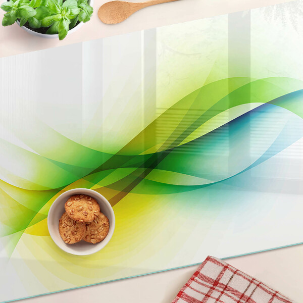 Schneidebrett Glas mit abstrakten Farbwellen