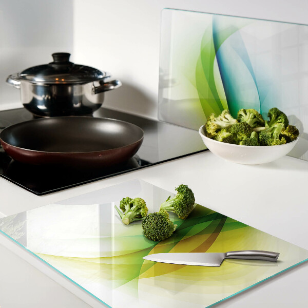 Schneidebrett Glas mit abstrakten Farbwellen