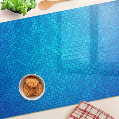 Glas schneidebrett mit wellenförmigem Muster in Blautönen