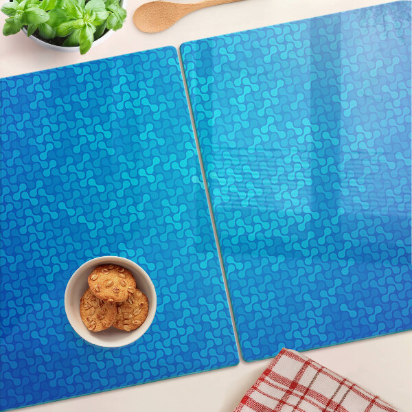 Glas schneidebrett mit wellenförmigem Muster in Blautönen