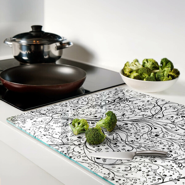 Glas schneidebrett Ein Pflanzenmuster mit zarten Zweigen