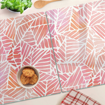 Glas Schneidebrett mit Blattmotiv in Pastelltönen