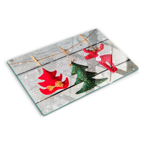 Schneidebrett mit Weihnachtsdekorationen auf Holzoptik