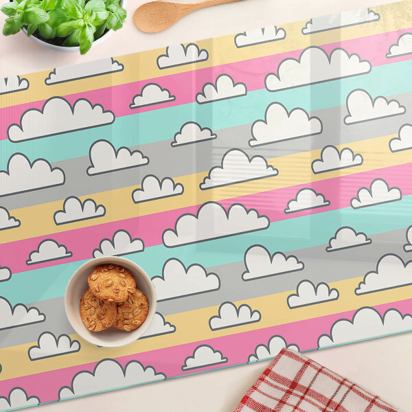 Schneidebrett Glas mit Wolkenmuster auf pastellfarbenem Hintergrund