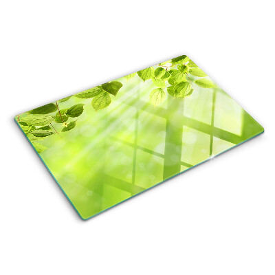 Schneidebrett Glas mit grünem Blattmotiv im Lichtdesign