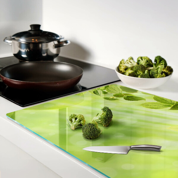 Schneidebrett glas Grüne Blätter im Licht