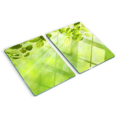 Schneidebrett Glas mit grünem Blattmotiv im Lichtdesign