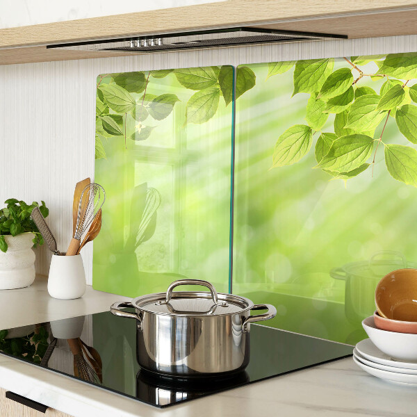 Schneidebrett Glas mit grünem Blattmotiv im Lichtdesign
