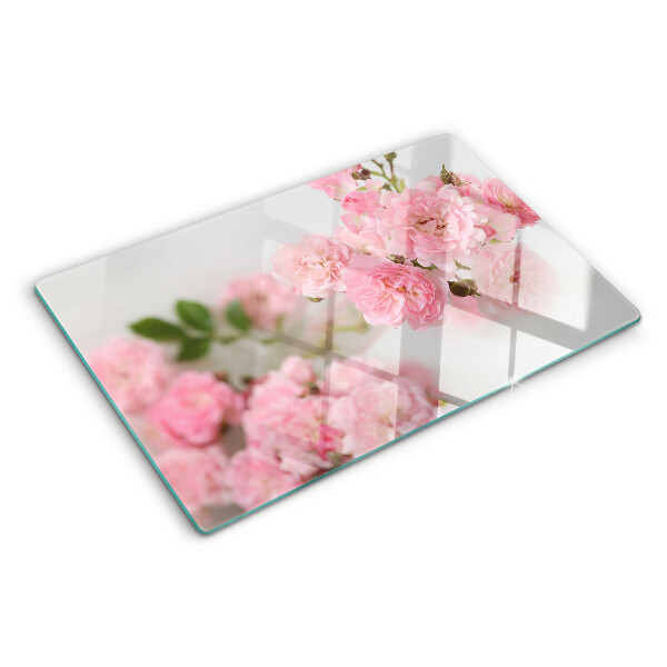 Glas schneidebrett Rosa Blumen in einer Vase