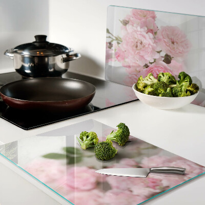 Glas schneidebrett Rosa Blumen in einer Vase