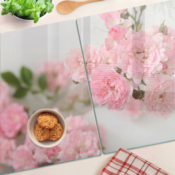 Glas schneidebrett Rosa Blumen in einer Vase