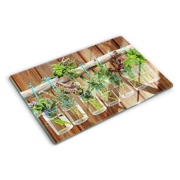 Schneidebrett Glas mit Motiv Kräuter in Gläsern auf Holzgrund