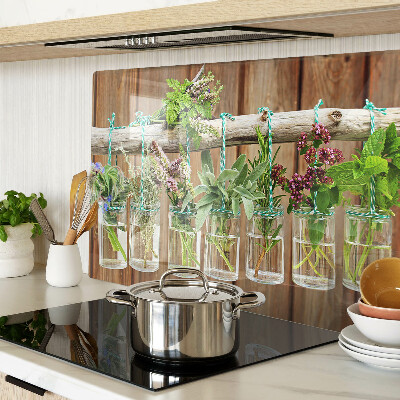 Schneidebrett Glas mit Motiv Kräuter in Gläsern auf Holzgrund